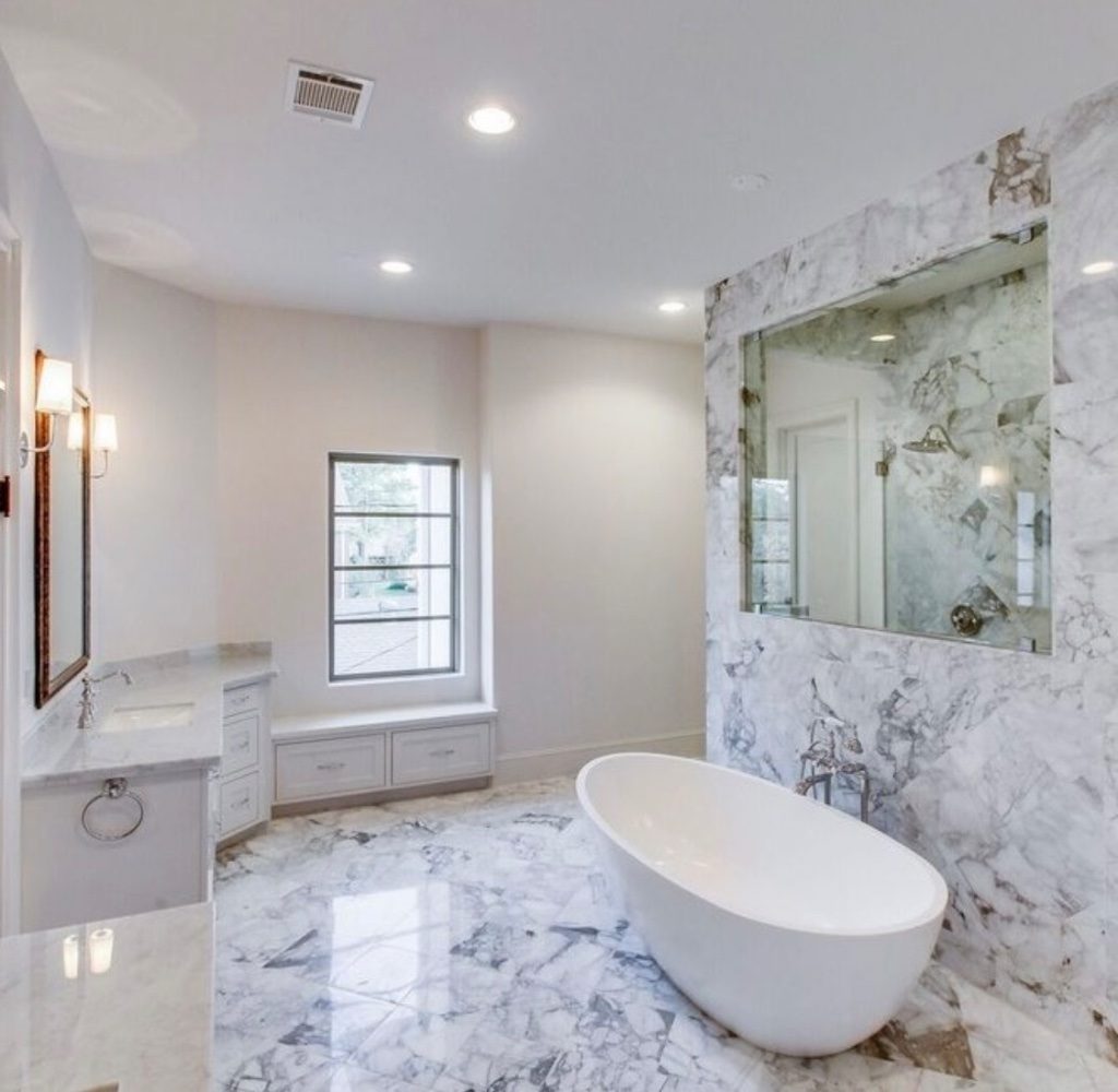 Completed bathroom renovation with walk-in shower