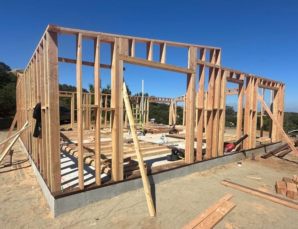 Framing and foundation work for a backyard ADU construction project