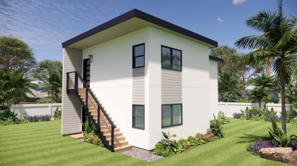 Two-story modern ADU construction with white exterior and black trim