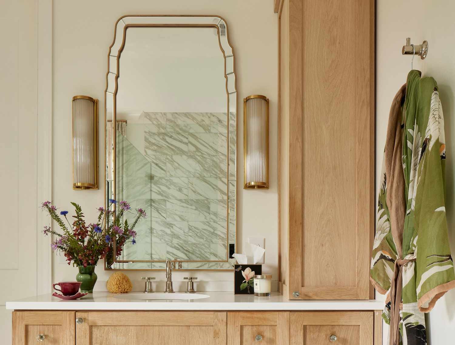 New bathroom vanity installation with double sinks and large mirrors