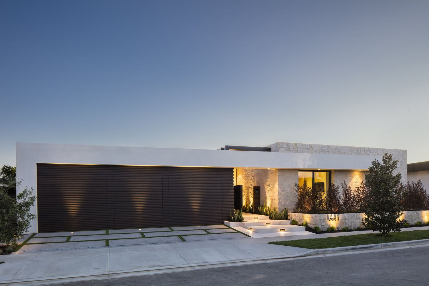 Modern concrete driveway featuring a smooth finish and clean edges