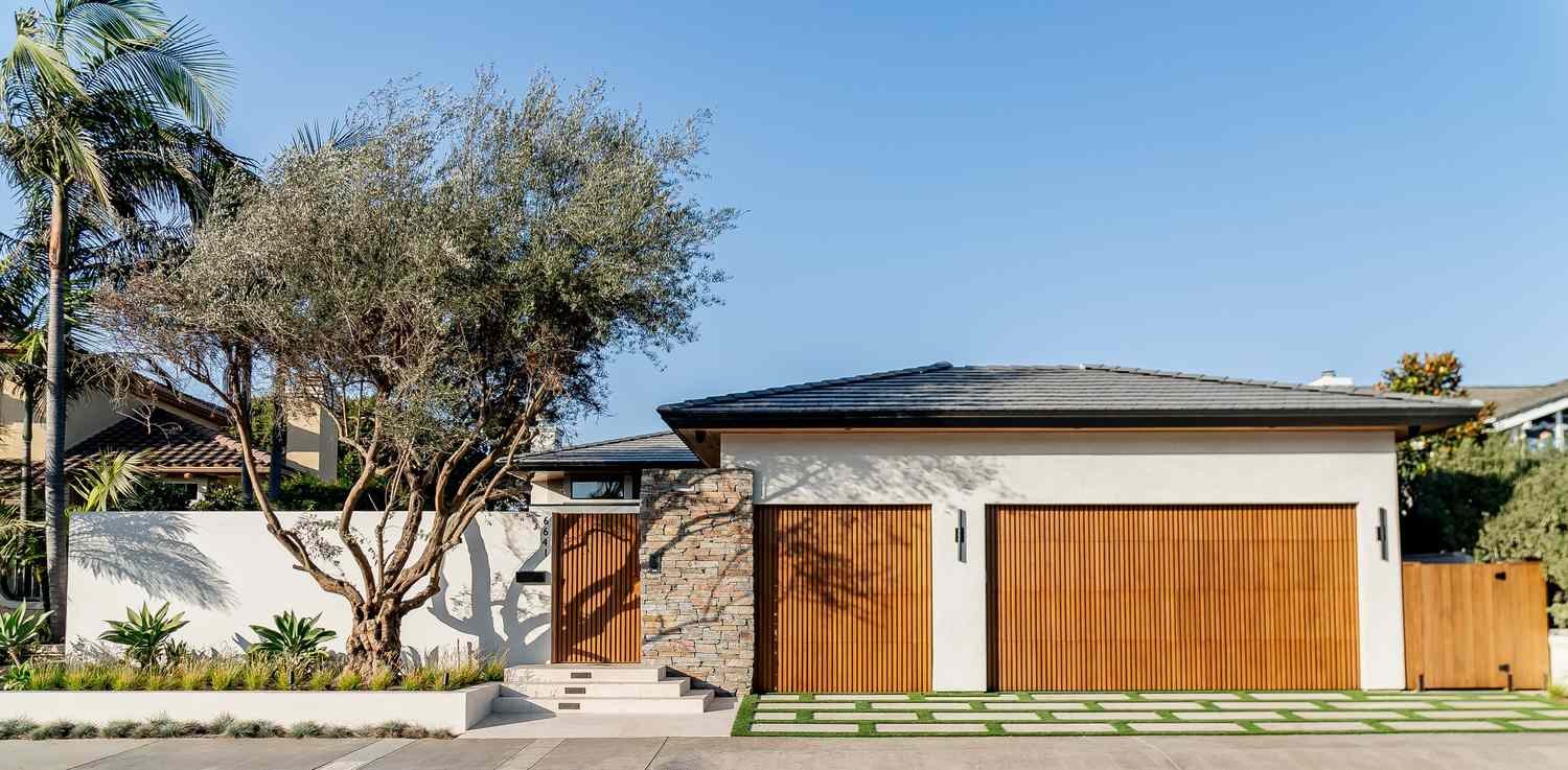 Modern residential concrete driveway with decorative scoring