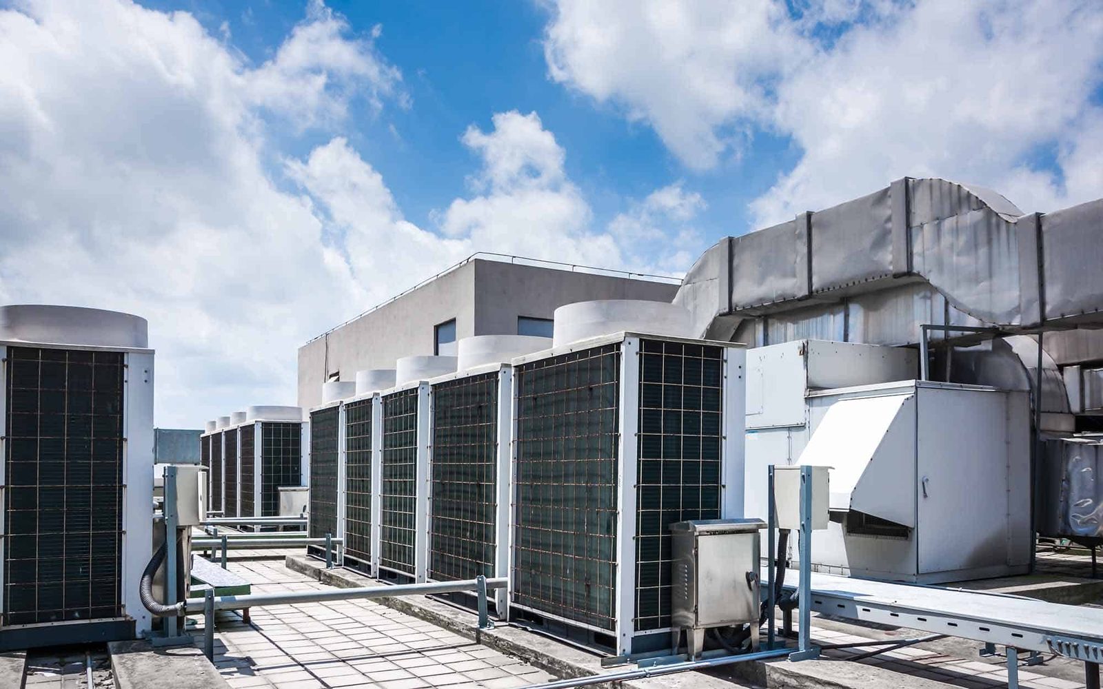 Commercial energy-efficient HVAC system units installed on a rooftop