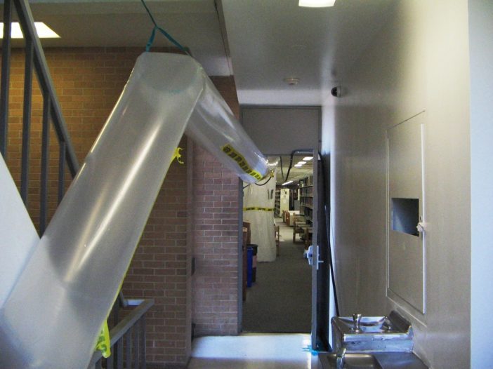 Plastic sheeting used for mold containment during remediation process