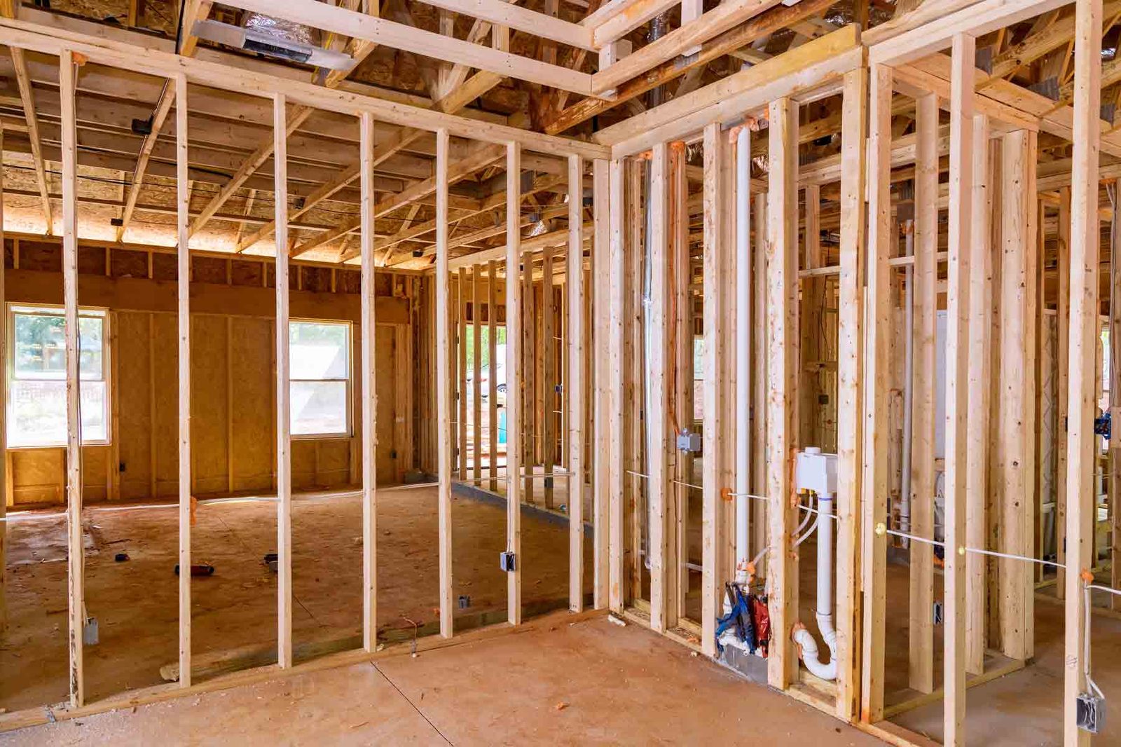 Exposed wood framing during a gutted whole-home renovation project