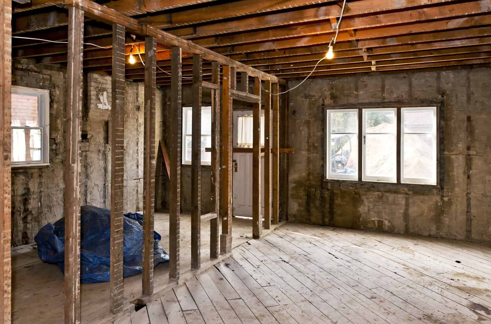 Interior view of a house stripped to the studs for a complete home renovation