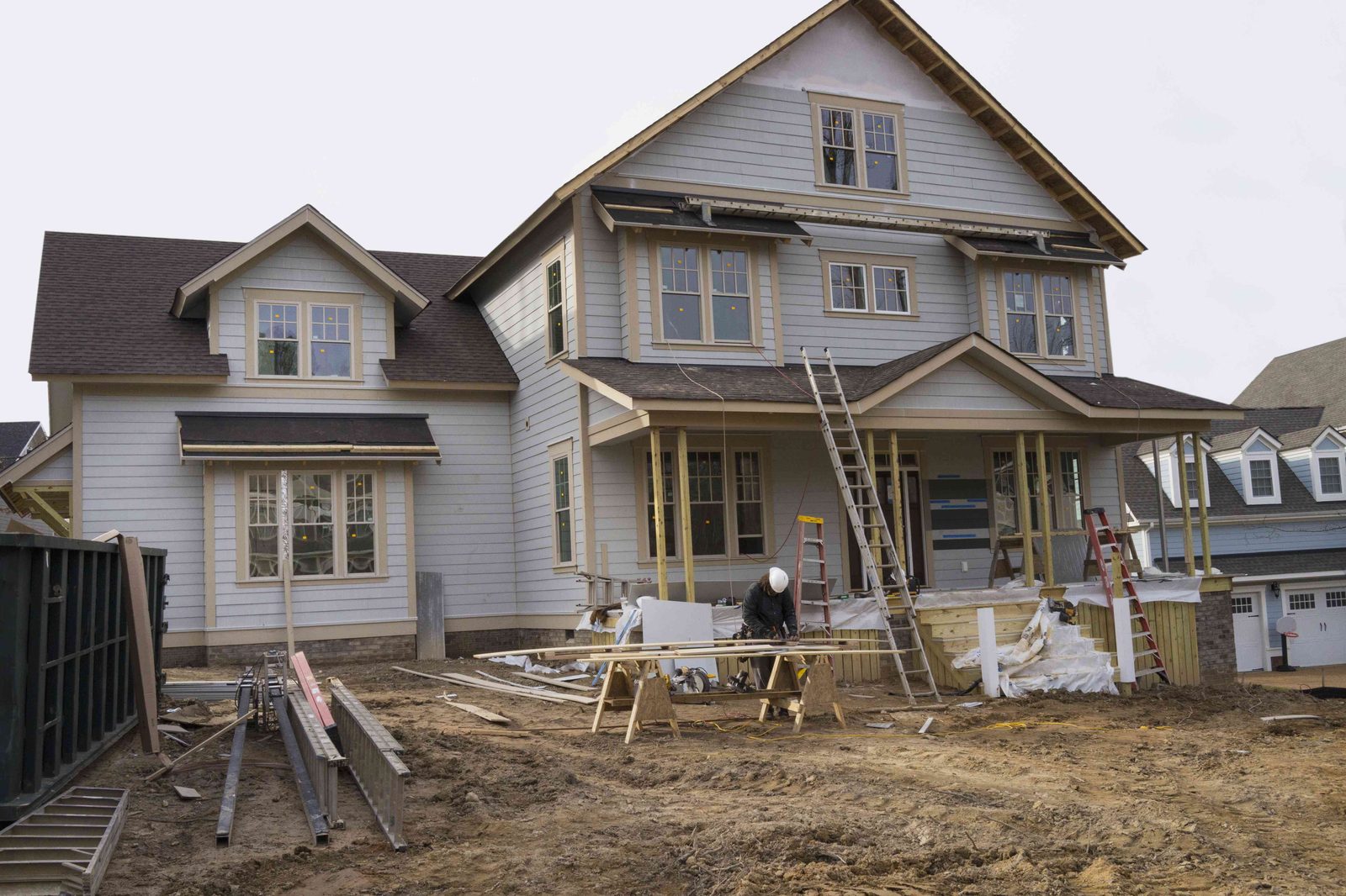 Exterior view of a residential property undergoing a major whole-home renovation