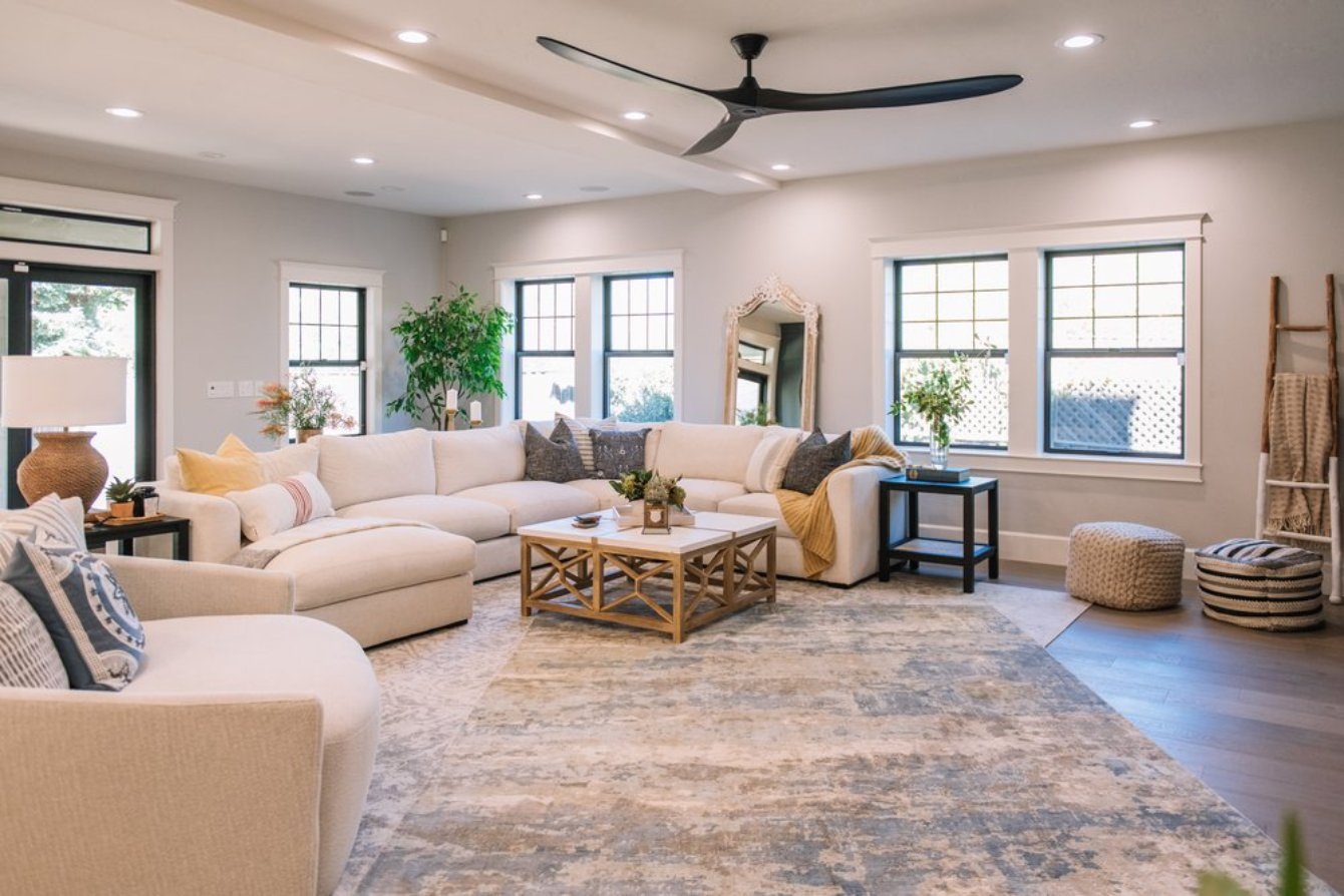 Modern living room design resulting from a comprehensive whole-home renovation
